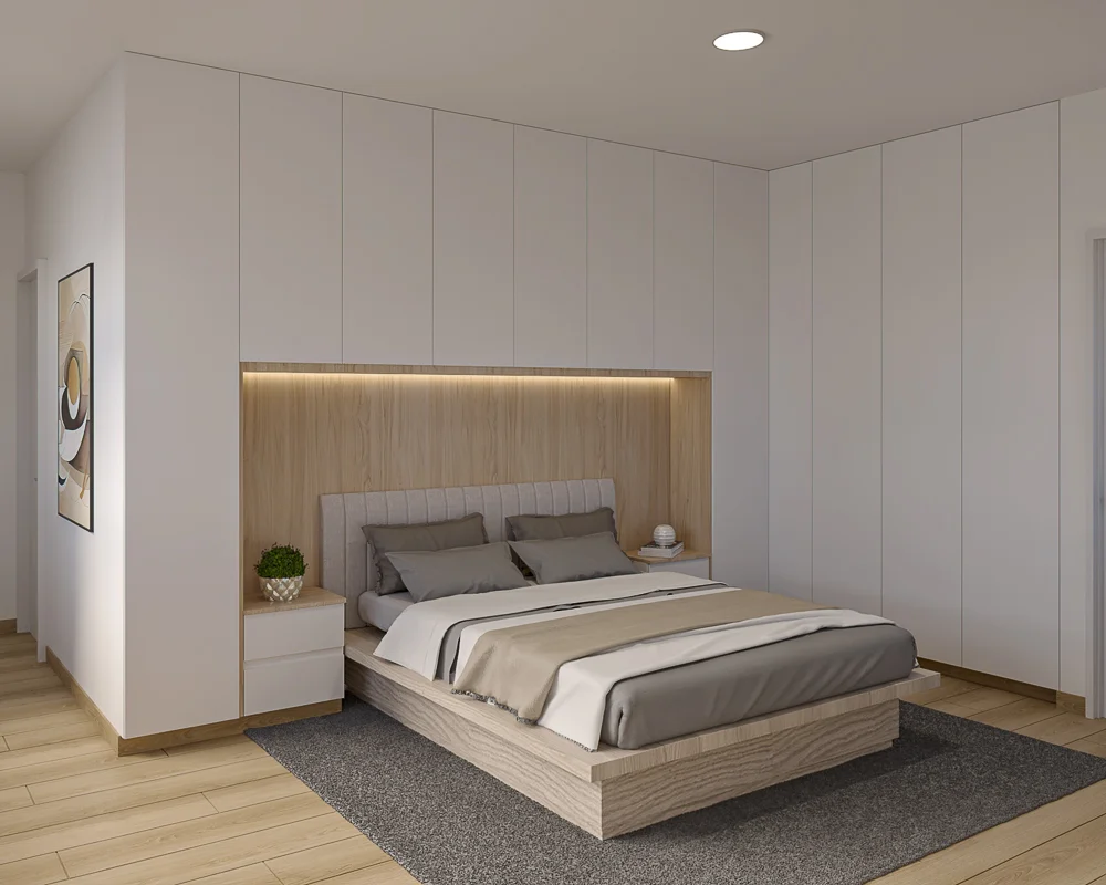 Dormitorio principal con cama de madera y clóset de pared a pared con nicho iluminado.